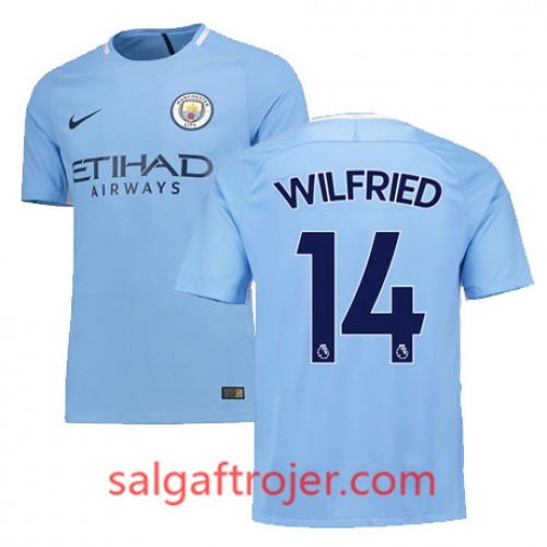 Manchester City Fodboldtrøjer WILFRIED Hjemmebanesæt 2017/18 Kort ærmer Manchester City Fodboldtrøjer WILFRIED Hjemmebanesæt 2017/18 Kort ærmer