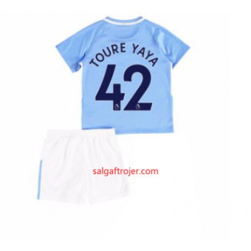 Manchester City Fodboldtrøjer Yaya Toure 42 Børn Hjemmebanesæt 2017/18 Kort ærmer Manchester City Fodboldtrøjer Yaya Toure 42 Børn Hjemmebanesæt 2017/18 Kort ærmer